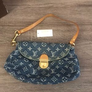 Loui Vuitton denim purse. Small, adjustable strap